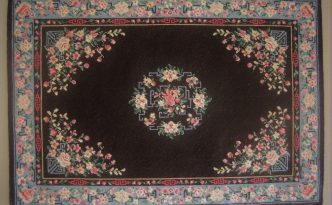 petit point miniature Oriental carpet worked on silk gauze