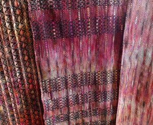 Weavings with handdyed warp
