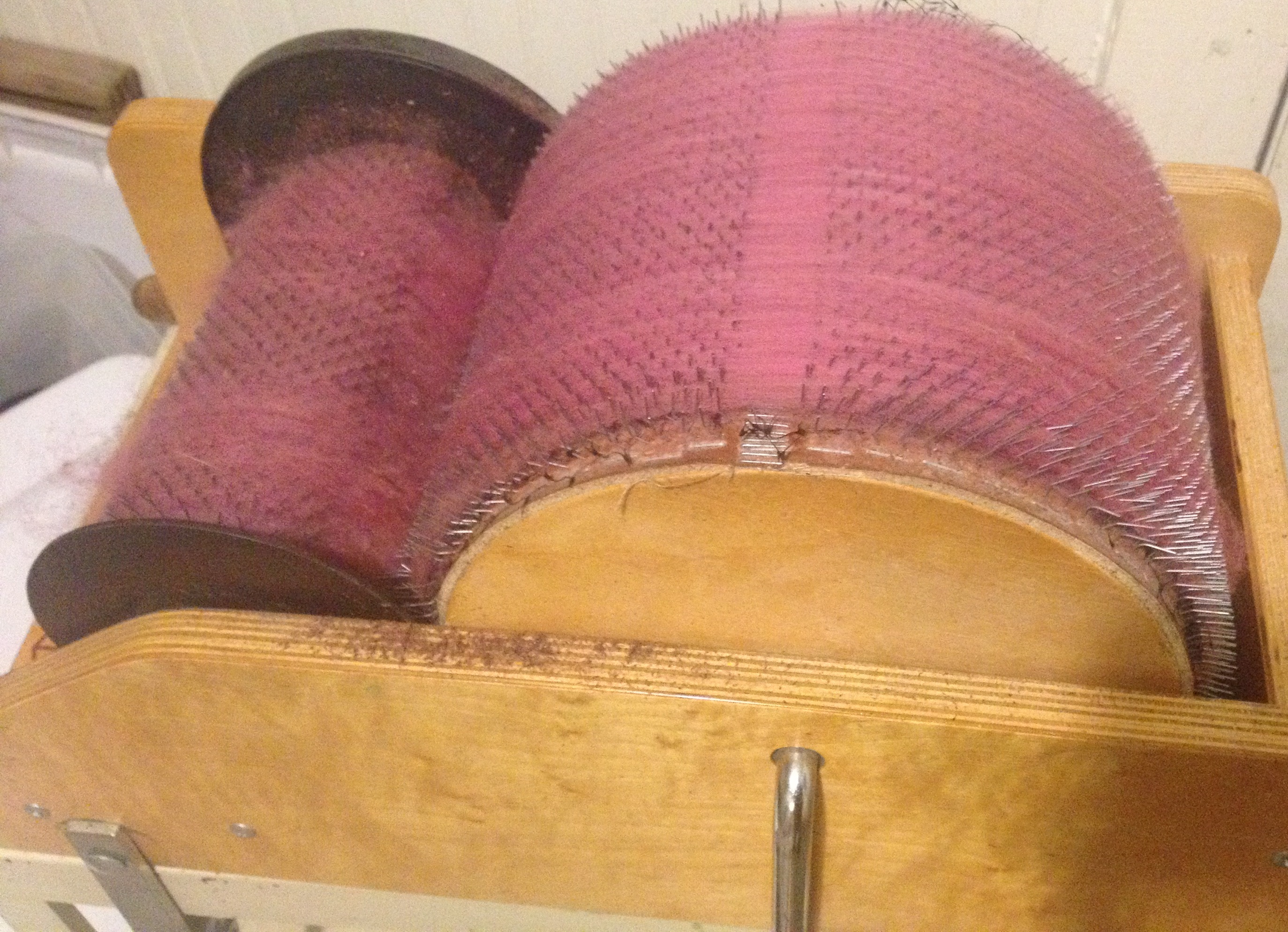 rose pink wool on drum carder
