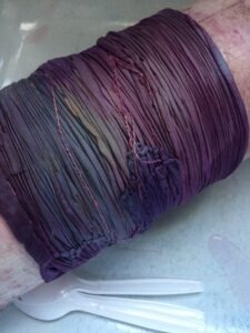 arashi shibori silk wrapped around a pvc pipe for dyeing with natural dyes at slowyarn.com