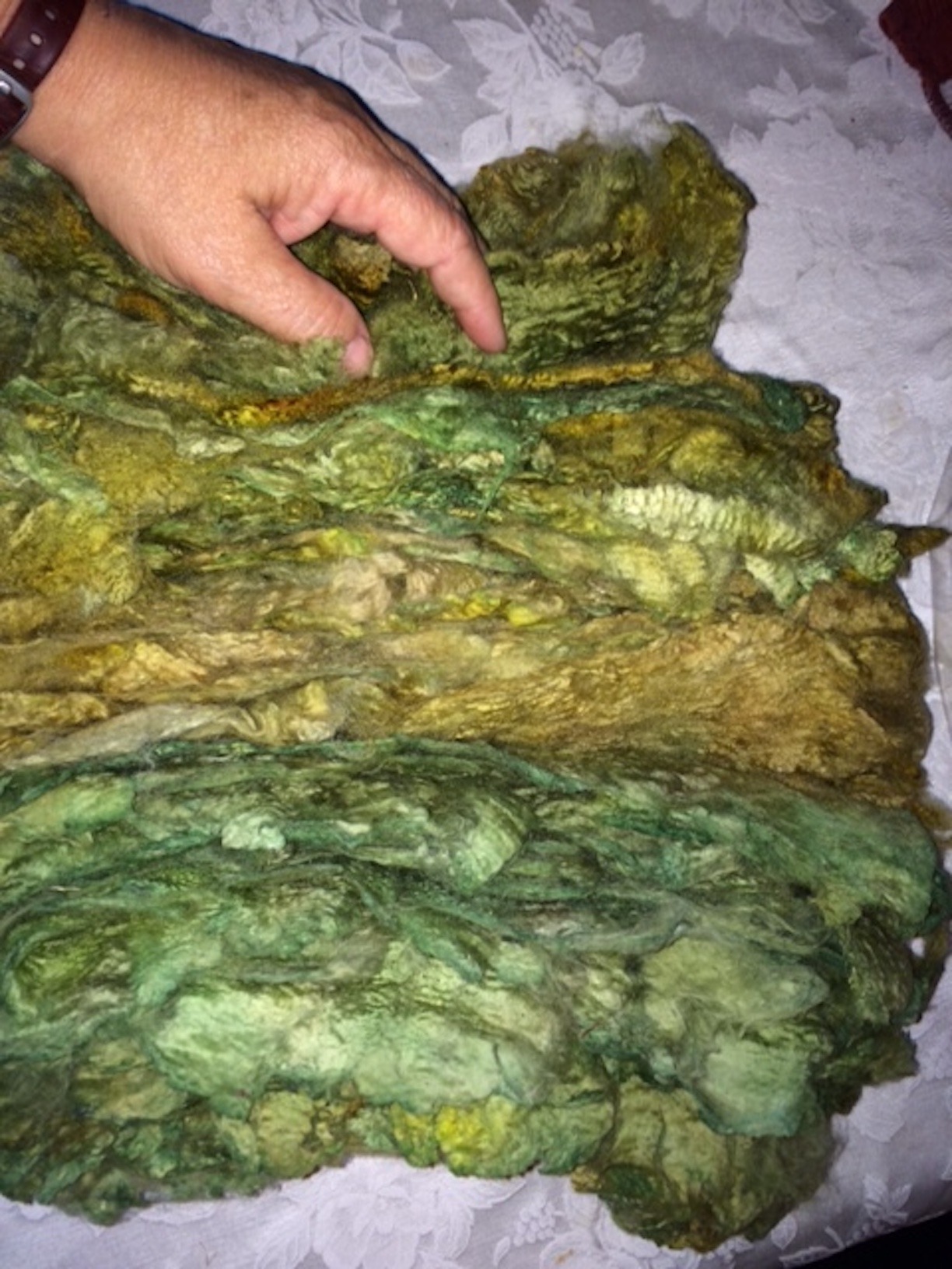 merino wool washed, dyed, and dried in the lock