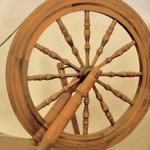Drive wheel on an old-fashioned spinning wheel